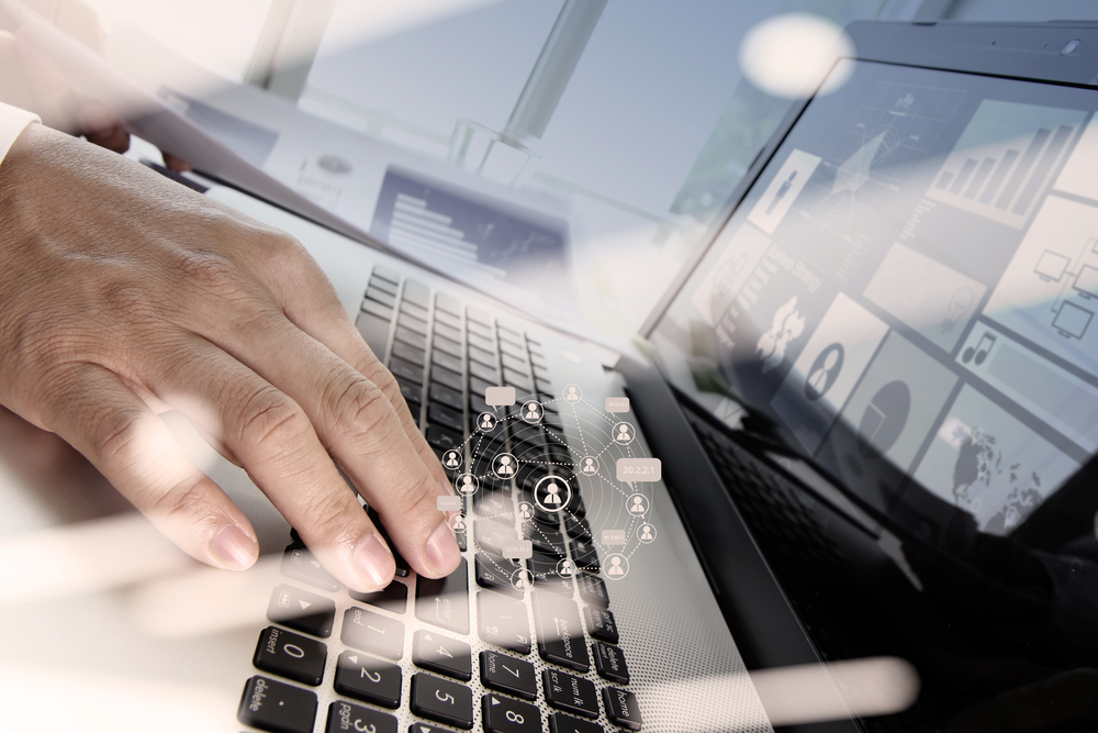 Double exposure of businessman hand working with new modern computer and business strategy as concept-2